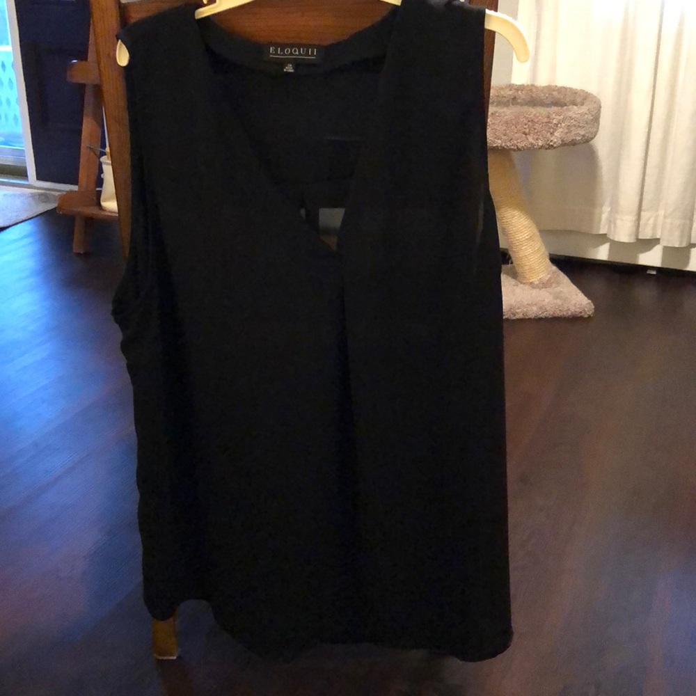Women’s plus size black sleeveless blouse.